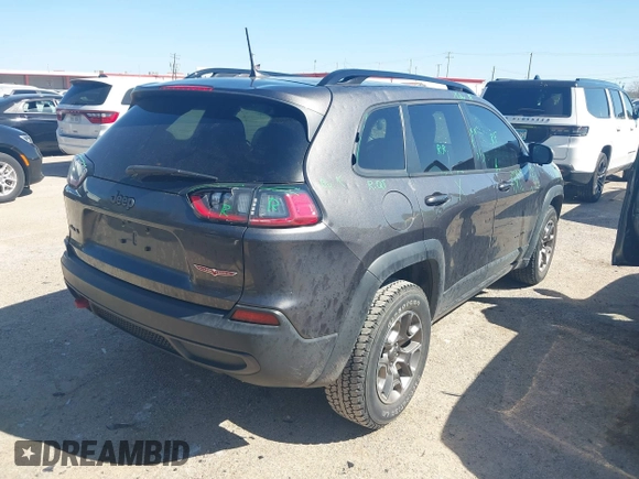 2022 Jeep Cherokee Trailhawk with VIN 1C4PJMBX4ND535037, listed as a IAAI auction lot 41779140 with 49,733 mi miles. Bid and sale history available at carsss.com. Image 4.