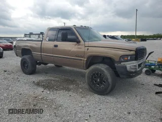 2001 Dodge 2500 z VIN 3B7KF23611G707673, wystawiony jako Copart lot #54608365 z przebiegiem 286 072 mil mil oraz Szkoda całkowita • Salvage title. Historia ofert i sprzedaży dostępna na DreamBid. Obrazek 4.