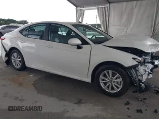 2025 Toyota Camry LE with VIN 4T1DAACK9SU112515, listed as a IAAI auction lot 41932562 with 587 mi miles and . Bid and sale history available at DreamBid. Image 13.