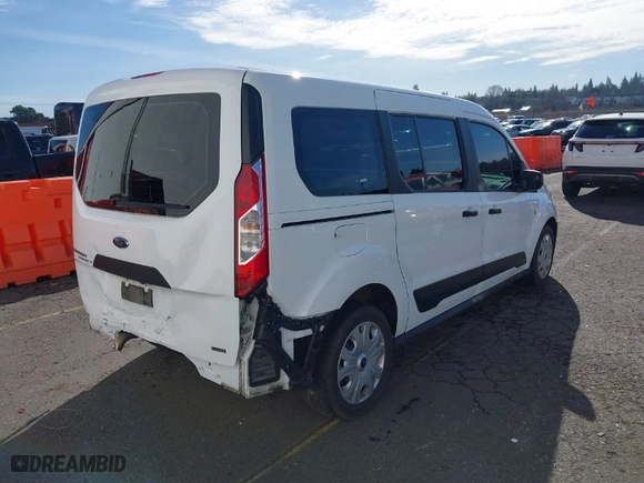 2021 Ford Transit Connect Wagon XL with VIN NM0GE9E28M1491106, listed as a IAAI auction lot 41664934 with 66,890 mi miles. Bid and sale history available at carsss.com. Image 4.