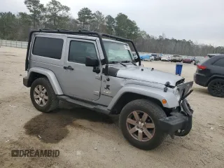 2015 Jeep Wrangler Sahara with VIN 1C4AJWBG8FL651169, listed as a Copart auction lot 44468995 with 119,419 mi miles and Salvage title. Bid and sale history available at DreamBid. Image 4.