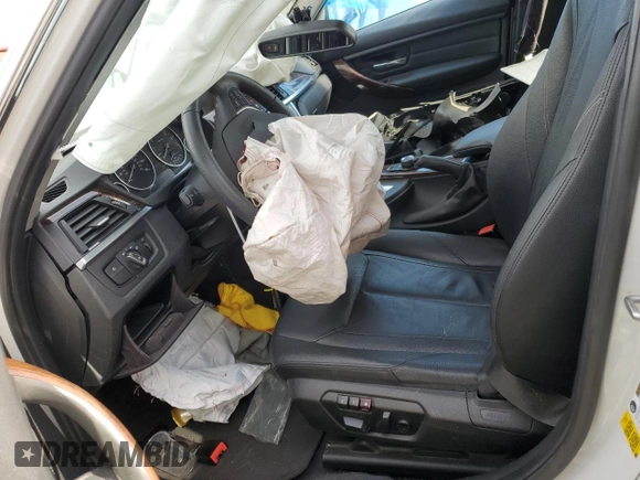 2014 BMW 3 Series 328i with VIN WBA3C1C53EK112799, listed as a Copart auction lot 61493585 with Not provided miles and Salvage title. Bid and sale history available at DreamBid. Image 7.