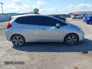 2016 Honda Fit EX-L with VIN 3HGGK5H90GM704300, listed as a IAAI auction lot 42462463 with 124,474 mi miles and . Bid and sale history available at DreamBid. Image 13.