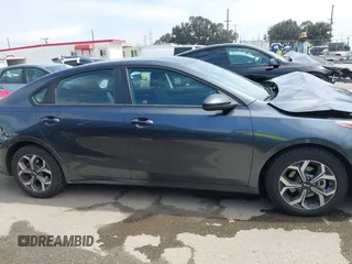2020 Kia Forte LXS with VIN 3KPF24AD9LE165263, listed as a IAAI auction lot 41808794 with 71,217 mi miles. Bid and sale history available at carsss.com. Image 13.