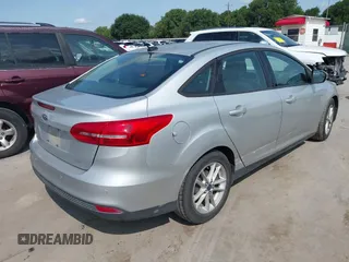 2015 Ford Focus SE z VIN 1FADP3F21FL348863, wystawiony jako IAAI lot #42401820 z przebiegiem 126 329 mil mil oraz . Historia ofert i sprzedaży dostępna na DreamBid. Obrazek 4.