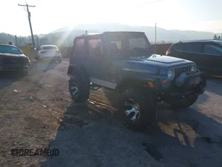 1999 Jeep Wrangler Sport z VIN 1J4FY19S3XP433305, wystawiony jako IAAI lot #41189189 z przebiegiem 109 945 mil mil oraz . Historia ofert i sprzedaży dostępna na DreamBid. Obrazek 1.