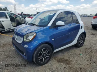 2016 Smart fortwo Passion z VIN WMEFJ5DA5GK058855, wystawiony jako Copart lot #57119445 z przebiegiem 173 493 mil mil oraz Szkody całkowita. Historia ofert i sprzedaży dostępna na DreamBid. Obrazek 1.