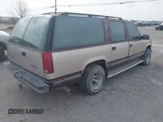 1993 GMC Suburban with VIN 1GKEC16KXPJ734150, listed as a IAAI auction lot 42114021 with 254,501 mi miles and . Bid and sale history available at DreamBid. Image 4.