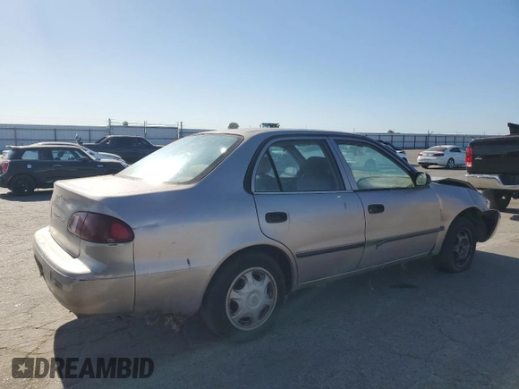 1998 Toyota Corolla VE with VIN 1NXBR12E3WZ093073, listed as a Copart auction lot 58270705 with 303,875 mi miles and Salvage title. Bid and sale history available at DreamBid. Image 3.