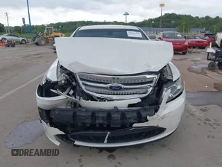 2011 Ford Taurus Limited z VIN 1FAHP2FW4BG157536, wystawiony jako IAAI lot #42186359 z przebiegiem 199 221 mil mil oraz . Historia ofert i sprzedaży dostępna na DreamBid. Obrazek 13.