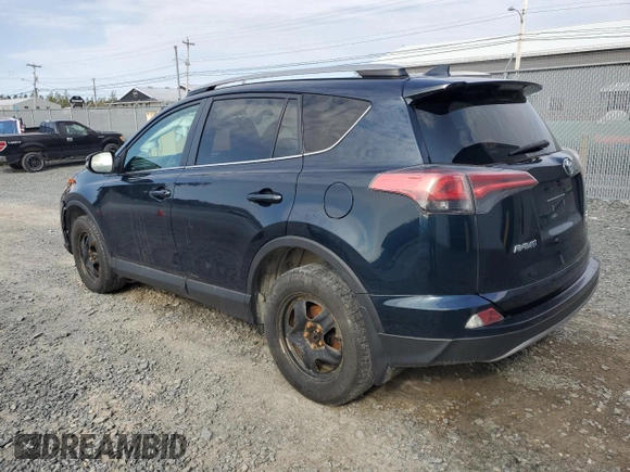 2017 Toyota RAV4 SE with VIN 2T3JFREVXHW618252, listed as a Copart auction lot 55743505 with 164,725 mi miles and Salvage title. Bid and sale history available at DreamBid. Image 2.
