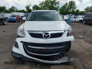 2012 Mazda CX-9 Touring with VIN JM3TB3CV2C0338611, listed as a Copart auction lot 61193625 with 115,817 mi miles and Salvage title. Bid and sale history available at DreamBid. Image 5.