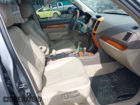 2005 Lexus GX 470 with VIN JTJBT20X650076318, listed as a IAAI auction lot 41896094 with 221,348 mi miles and . Bid and sale history available at DreamBid. Image 5.