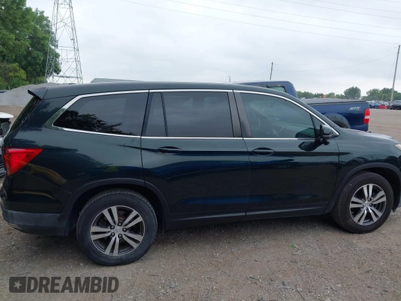 2016 Honda Pilot EX-L with VIN 5FNYF6H59GB100369, listed as a IAAI auction lot 42684252 with 146,609 mi miles and . Bid and sale history available at DreamBid. Image 13.