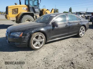 2012 Audi A8 with VIN WAUAVAFD2CN008675, listed as a Copart auction lot 73230554 with 112,946 mi miles and Salvage title. Bid and sale history available at DreamBid. Image 1.