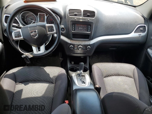 2013 Dodge Journey SE with VIN 3C4PDCAB0DT500365, listed as a Copart auction lot 61033665 with 193,231 mi miles and Salvage title. Bid and sale history available at DreamBid. Image 8.