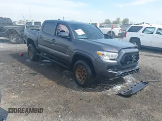 2023 Toyota Tacoma SR z VIN 3TYCZ5AN5PT144908, wystawiony jako IAAI lot #41888100 z przebiegiem 21 894 mil mil oraz . Historia ofert i sprzedaży dostępna na DreamBid. Obrazek 1.