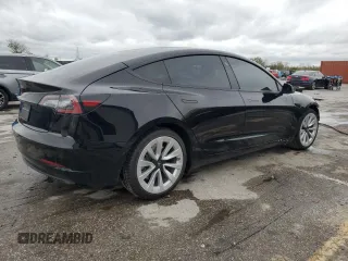 2022 Tesla Model 3 with VIN 5YJ3E1EA0NF186296, listed as a Copart auction lot 45711405 with 75,653 mi miles and Salvage Title. Bid and sale history available at DreamBid. Image 3.