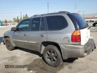 2005 GMC Envoy SLT with VIN 1GKDS13S952382088, listed as a Copart auction lot 64765154 with 177,333 mi miles and Salvage Title. Bid and sale history available at carsss.com. Image 2.