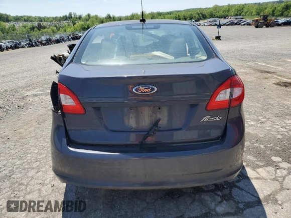 2012 Ford Fiesta S with VIN 3FADP4AJ1CM123454, listed as a Copart auction lot 86797664 with Not provided miles and Salvage title. Bid and sale history available at DreamBid. Image 6.