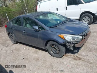 2015 Kia Forte EX with VIN KNAFX4A84F5263604, listed as a IAAI auction lot 41981429 with 203,918 mi miles. Bid and sale history available at carsss.com. Image 1.