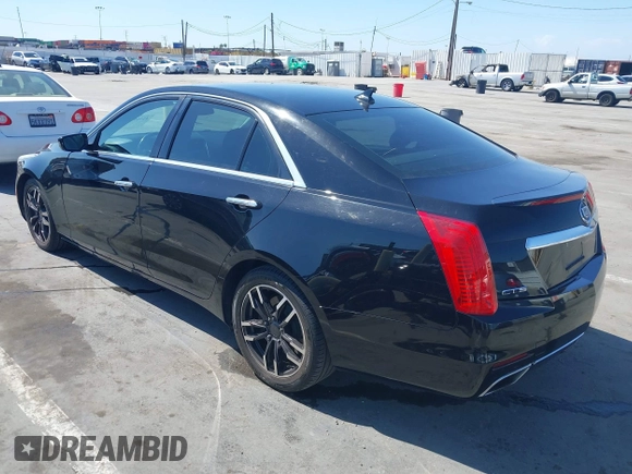 2014 Cadillac CTS RWD with VIN 1G6AP5SX0E0126103, listed as a IAAI auction lot 42160002 with 49,187 mi miles and . Bid and sale history available at DreamBid. Image 3.