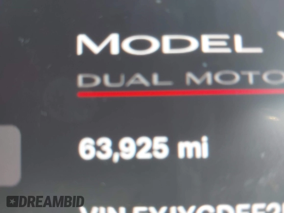2021 Tesla Model Y Performance z VIN 5YJYGDEF2MF215938, wystawiony jako IAAI lot #41338287 z przebiegiem 63 925 mil mil oraz . Historia ofert i sprzedaży dostępna na DreamBid. Obrazek 14.