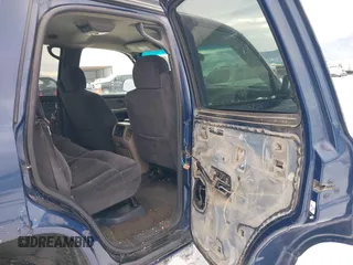 2002 Chevrolet Tahoe LS with VIN 1GNEK13V12J330179, listed as a IAAI auction lot 41382530 with 216,051 mi miles and . Bid and sale history available at DreamBid. Image 8.