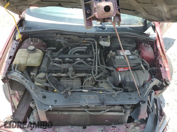 2007 Ford Focus S z VIN 1FAFP31N37W130031, wystawiony jako Copart lot #60123195 z przebiegiem 154 833 mil mil oraz Szkoda całkowita • Salvage title. Historia ofert i sprzedaży dostępna na DreamBid. Obrazek 11.