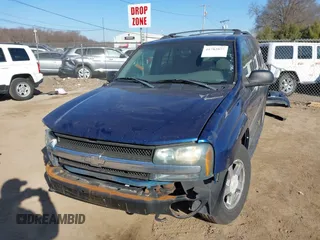 2004 Chevrolet TrailBlazer LS with VIN 1GNDT13S642345935, listed as a IAAI auction lot 41782077 with 174,938 mi miles. Bid and sale history available at carsss.com. Image 2.