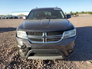 2017 Dodge Journey SXT with VIN 3C4PDCBG0HT589032, listed as a Copart auction lot 62342525 with 121,980 mi miles and Salvage title. Bid and sale history available at DreamBid. Image 5.