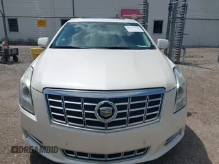 2013 Cadillac XTS Luxury with VIN 2G61P5S34D9138319, listed as a IAAI auction lot 42626756 with 88,743 mi miles and . Bid and sale history available at DreamBid. Image 6.