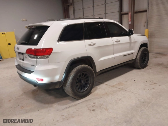 2018 Jeep Grand Cherokee Laredo E with VIN 1C4RJFAG0JC105804, listed as a IAAI auction lot 41587036 with 107,601 mi miles. Bid and sale history available at carsss.com. Image 4.