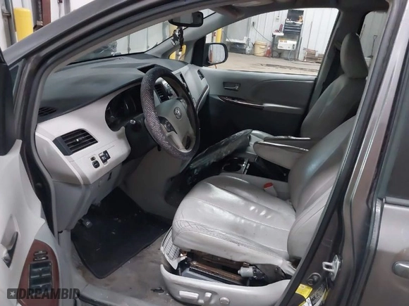 2012 Toyota Sienna XLE AAS with VIN 5TDYK3DC9CS268758, listed as a IAAI auction lot 41613513 with 214,601 mi miles. Bid and sale history available at carsss.com. Image 5.