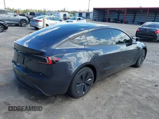 2025 Tesla Model 3 Long Range with VIN 5YJ3E1EA9SF897555, listed as a IAAI auction lot 41886716 with 6,757 mi miles and . Bid and sale history available at carsss.com. Image 4.