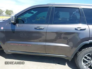 2017 Jeep Grand Cherokee Trailhawk with VIN 1C4RJFLG3HC877110, listed as a IAAI auction lot 42276506 with 144,993 mi miles and . Bid and sale history available at DreamBid. Image 15.
