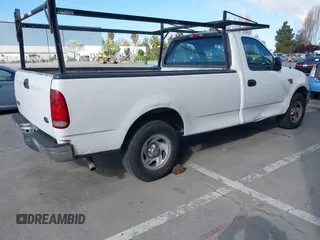 2000 Ford F-150 XL with VIN 1FTRF17WXYKA72880, listed as a IAAI auction lot 41989317 with 149,967 mi miles. Bid and sale history available at carsss.com. Image 4.