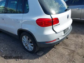 2012 Volkswagen Tiguan S with VIN WVGBV7AX0CW582922, listed as a IAAI auction lot 41906974 with 150,681 mi miles and . Bid and sale history available at DreamBid. Image 6.