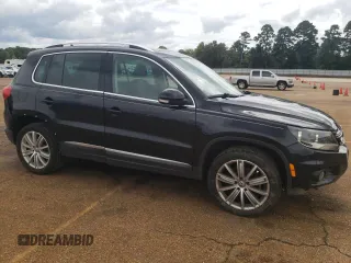 2014 Volkswagen Tiguan SEL with VIN WVGAV3AX5EW558929, listed as a Copart auction lot 71004684 with 125,628 mi miles and Clean title. Bid and sale history available at DreamBid. Image 4.