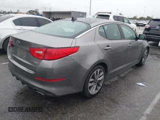 2014 Kia Optima SXL Turbo with VIN 5XXGR4A65EG342564, listed as a IAAI auction lot 41725578 with 159,937 mi miles and . Bid and sale history available at DreamBid. Image 4.