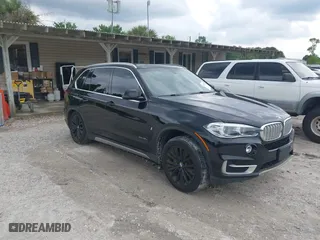 2017 BMW X5 xDrive40e iPerformance with VIN 5UXKT0C30H0V95867, listed as a IAAI auction lot 42122827 with 84,271 mi miles. Bid and sale history available at carsss.com. Image 1.
