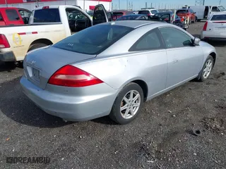 2004 Honda Accord Cpe EX with VIN 1HGCM82664A010907, listed as a IAAI auction lot 42086599 with 215,595 mi miles. Bid and sale history available at carsss.com. Image 4.
