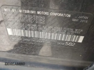 2016 Mitsubishi Lancer GT with VIN JA32U8FW8GU011501, listed as a IAAI auction lot 41779016 with 153,082 mi miles. Bid and sale history available at carsss.com. Image 9.