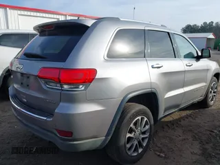2016 Jeep Grand Cherokee Limited 75th Anniversary with VIN 1C4RJFBG5GC401277, listed as a IAAI auction lot 41119644 with 156,658 mi miles and . Bid and sale history available at DreamBid. Image 4.