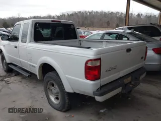 2002 Ford Ranger XLT Off-Road z VIN 1FTZR45U32PA34265, wystawiony jako IAAI lot #41449849 z przebiegiem 192 161 mil mil oraz . Historia ofert i sprzedaży dostępna na DreamBid. Obrazek 3.