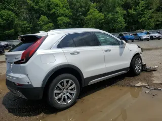 2019 Cadillac XT4 FWD Premium Luxury z VIN 1GYFZCR41KF127888, wystawiony jako Copart lot #55027135 z przebiegiem 111 057 mil mil oraz Szkody całkowita. Historia ofert i sprzedaży dostępna na DreamBid. Obrazek 3.