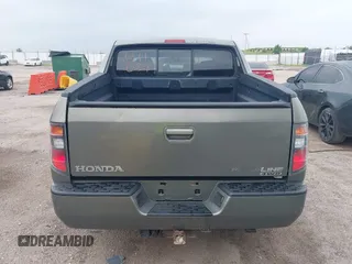 2007 Honda Ridgeline RTL with VIN 2HJYK16517H513832, listed as a IAAI auction lot 42626411 with 209,171 mi miles and . Bid and sale history available at DreamBid. Image 16.