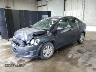 2014 Chevrolet Sonic LT z VIN 1G1JC5SH1E4118997, wystawiony jako Copart lot #70792334 z przebiegiem 166 691 mil mil oraz Szkoda całkowita • Salvage title. Historia ofert i sprzedaży dostępna na DreamBid. Obrazek 1.