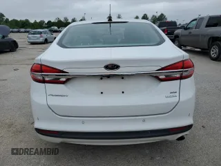 2017 Ford Fusion SE z VIN 3FA6P0HD9HR123410, wystawiony jako Copart lot #59807795 z przebiegiem 131 641 mil mil oraz Czysty tytuł • Clean title. Historia ofert i sprzedaży dostępna na DreamBid. Obrazek 7.