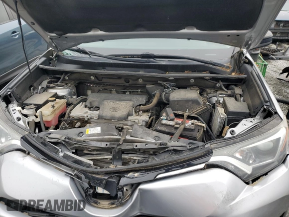 2017 Toyota RAV4 LE z VIN 2T3BFREV1HW645599, wystawiony jako Copart lot #58500105 z przebiegiem 83 266 mil mil oraz Szkoda całkowita • Salvage title. Historia ofert i sprzedaży dostępna na DreamBid. Obrazek 12.